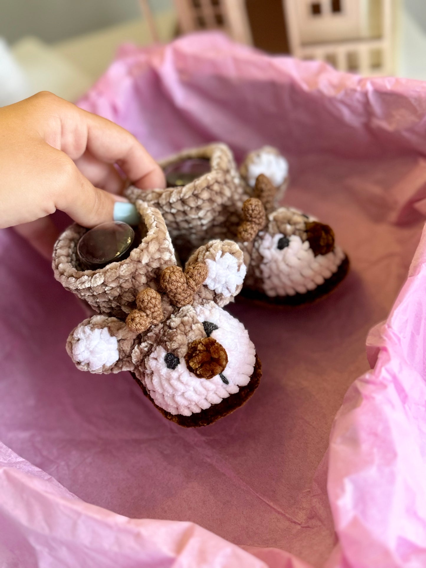 Set for newborn. First Toy and Booties